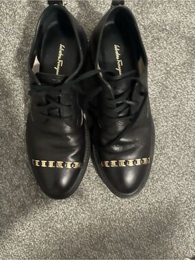 Salvatore Ferragamo Black Leather Lace-Up Oxfords with Gold Chain Accent